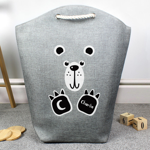 Black and white bear toy and laundry basket