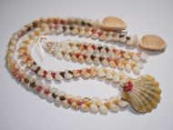 19 3/4" blue, yellow, white Momi with pink, red, black, green Kahelelani shells design in Heliconia style with Sunrise shell lei #1013