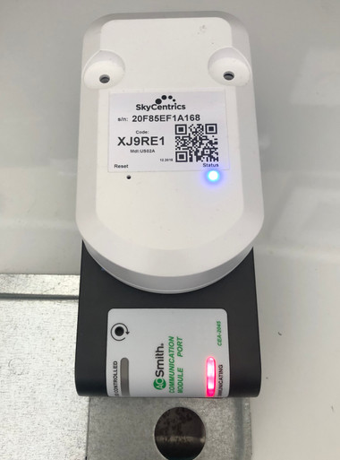 SkyCentrics AC CTA-2045 Wi-Fi module on top of the AO Smith CTA-2045 port adaptor