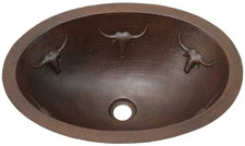 Oval copper sink with Longhorn design.