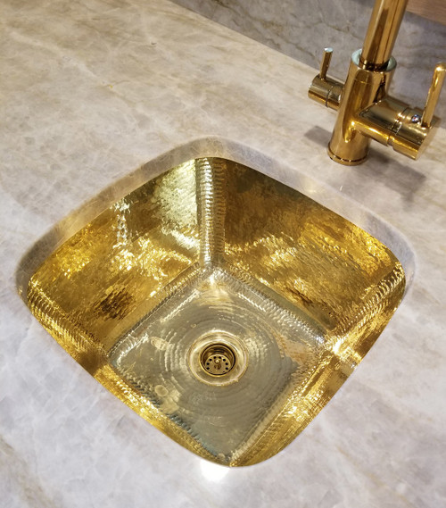 Installed hammered brass sink in shiny brass SBV13SB