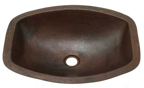 Hammered copper sink with hand crafted flat sided design.
