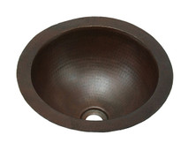 Small round copper bath sink in hammered copper.