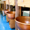 Awesome Spa with large hammered copper spa pedicure bowls.