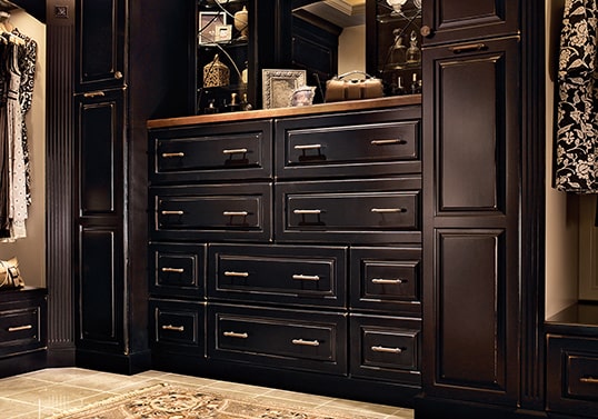 Traditional dressing room with built-in KraftMaid cabinets in Vintage Onyx