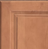 Corner of a KraftMaid cabinet door showing Maple wood in Ginger finish