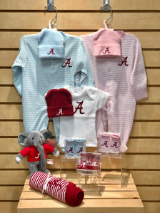 Quality made collegiate baby items: newborn booties, newborn caps, newborn and 0-3 month footies, newborn t-shirt, baby blanket and a Big Al plush toy