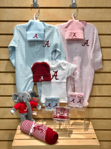 Quality made collegiate baby items: newborn booties, newborn caps, newborn and 0-3 month footies, newborn t-shirt, baby blanket and a Big Al plush toy