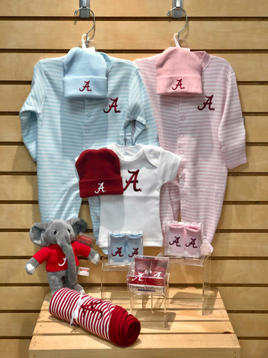Quality made collegiate baby items: newborn booties, newborn caps, newborn and 0-3 month footies, newborn t-shirt, baby blanket and a Big Al plush toy