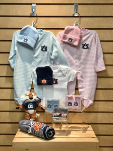 Quality made collegiate baby items: newborn cap, newborn/0-3 months footie, newborn t-shirt, newborn booties, baby blanket and an Aubie plush