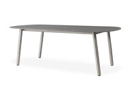Lloyd Flanders Elevation 84" Oval Umbrella Dining Table With Corian Top