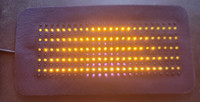 Yellow and Infrared LED pad, showing flexible design.