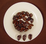 Liberica beans have a unique crescent shape and are larger than Arabica 