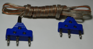Made with insulated electrical wiring that attaches to a three 4mm banana pins on each ends for the purposes of electronically calculating “hits” for scoring.
