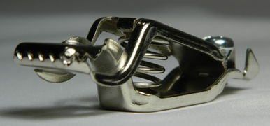 Alligator/Crocodile Clip
Replacement clip for Foil, Epee, Saber body cord that attaches to the Lame. In addition, can also be used as a replacement part for a straight or curly mask cord.
Angle view