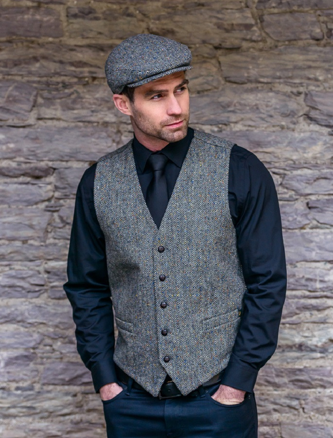 flat cap and waistcoat