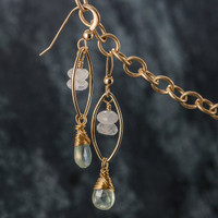 Gemstone earrings are elegant, lightweight and so feminine! Each earring is composed of 14KT. Gold Fill components, Moonstone Briolettes and Moonstone Rondelles. The ear wires are 14KT. Gold Filled.  Earrings are 1-3/4" long from the tip of the ear wires to the bottom tip of the dangles.