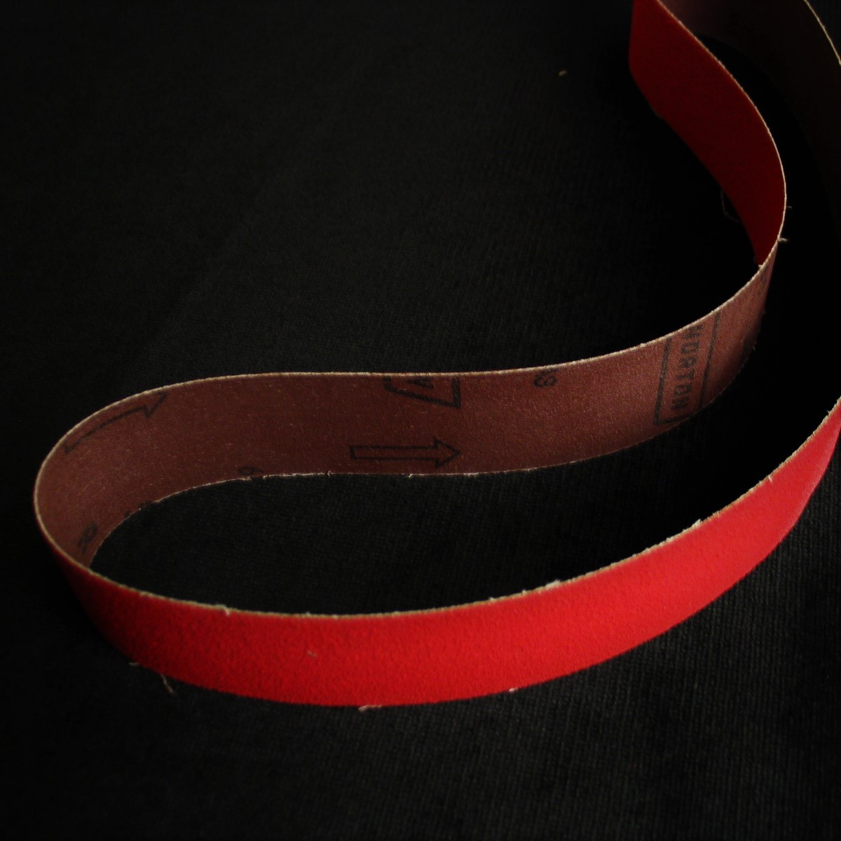 Abrasive belt clearance