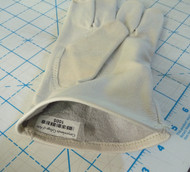 Iron-on tag inside a leather glove.