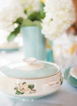 Tablescape of vintage turquoise lifetime china covered vegetable bowl with aqua pottery vase