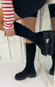 Kaira Zipped Knee High Boots In Black