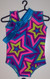 A doll leotard in the printed, hologram and/or metallic spandex fabrics shown (hanger is not included.)  Jillybeans 18" doll leotards were made to fit the American Girl Dolls, but will fit most other 18" similar body type dolls, including My Life and Our Generation.  All items will be tagged and bagged prior to shipment. FREE SHIPPING ON OUR DOLL LEOTARDS! BUY 3 OR MORE FOR DISCOUNTS. BUY 3-10, GET 10% OFF, BUY 11-25, GET 15% OFF, BUY 25-51, GET 25% OFF, BUY 101 OR MORE, GET 50% OFF.