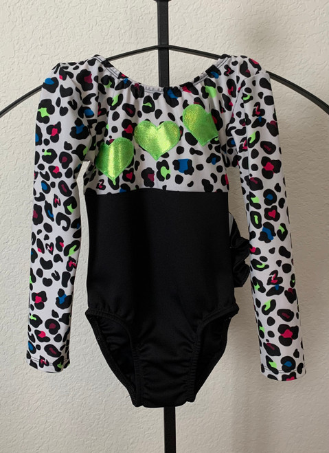 ONLY 1 AVAILABLE IN THIS SIZE AND STYLE! Closeout long sleeve gymnastics and/or dance leotard in the print shown.  Free scrunchie as always!

Due to the discount prices there are no returns or exchanges on these items.
