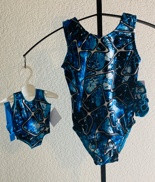 Gymnastics leotards in a blue CHAOS spandex - one for you and one for your 18" doll.  Free scrunchie included for you, and free headband for your doll. This doll leotard was made to fit the American Girl dolls, but will fit most similar body type 18" dolls.