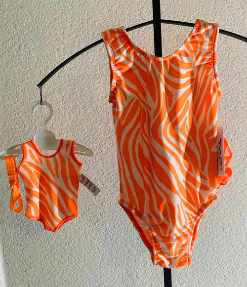 Gymnastics leotards in an orange/white ZEBRA spandex - one for you and one for your 18" doll.  Free scrunchie included for you, and free headband for your doll. This doll leotard was made to fit the American Girl dolls, but will fit most similar body type 18" dolls.