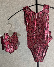 Gymnastics leotards in a pink CHEETAH spandex - one for you and one for your 18" doll.  Free scrunchie included for you, and free headband for your doll. This doll leotard was made to fit the American Girl dolls, but will fit most similar body type 18" dolls.
