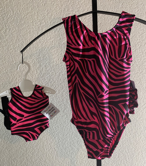 Gymnastics leotards in a pink/black ZEBRA spandex - one for you and one for your 18" doll.  Free scrunchie included for you, and free headband for your doll. This doll leotard was made to fit the American Girl dolls, but will fit most similar body type 18" dolls.