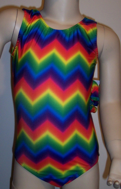 Bold gymnastics leotard in a primary colored chevron spandex. Available in tank or racer back styles. Free scrunchie is included as always!