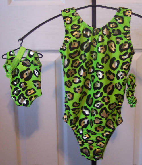 Tank style gymnastics leotards in a metallic lime panther spandex - one for you and one for your 18" doll.  Free scrunchie included for you, and free headband for your doll. This doll leotard was made to fit the American Girl dolls, but will fit most similar body type 18" dolls.