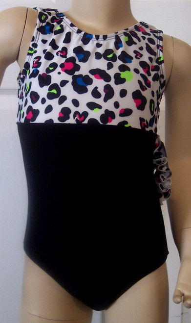 Cute tank style gymnastics and/or dance leotard in a SPRING CHEETAH spandex split with solid black spandex. Free scrunchie as always!
