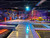 Multi-zone indoor playground and trampoline park equipment by Cheer Amusement commercial grade