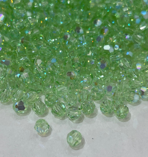 Swarovski Bead 5000 Chrysolite Aurore Boreale (238 AB)
