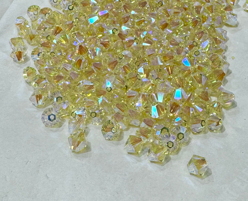 Swarovski Bead 5328 6mm Jonquil Aurore Boreale 2x (213 AB2)