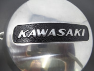 Black paint on Kawasaki lettering.