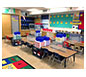 4-Way Desktop Sneeze Guard · Classroom Setting