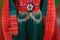 teal color afghan dress with chains medallions