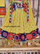 traditional kuchi style yellow gown