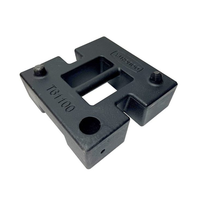 Doughty TV Brace Weight (T61100) shown in black with carry handle, location lugs, spigot hole, and strapping points.