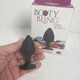 Doc Johnson Booty Bling Small Black Plug Pink Stone - Product SKU CNVNAL-56985