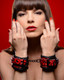 XR Brands Cuffed Embossed Wrist Cuffs Red Black - Product SKU CNVEF-EXR-AE142-WC