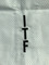 Traditional ITF letters embroidered on the legs