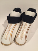 White and gold boots