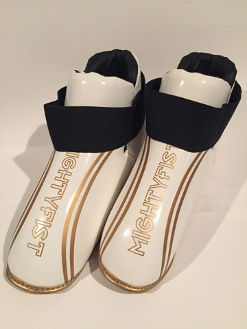 White and gold boots
