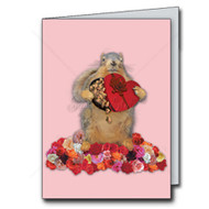 I'm Nuts About You Cards | Funny Squirrel Valentine's Day
Image is a pink card with a fuzzy squirrel holding a red heart-shaped box of chocolates surrounded by white, pink, & red roses.