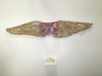 Guillermo Estrada-Viera,         "Corset para un largo viaje," 2015. Mixed media: aluminum school lunch tray, ration cards ("libretas"), papier-mâché chicken on cardboard.      18" x 95" x 10”                 #6322
