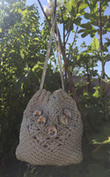 Crochet bag #058B. Dimensions 7.5" x 6" with pull tie straps 